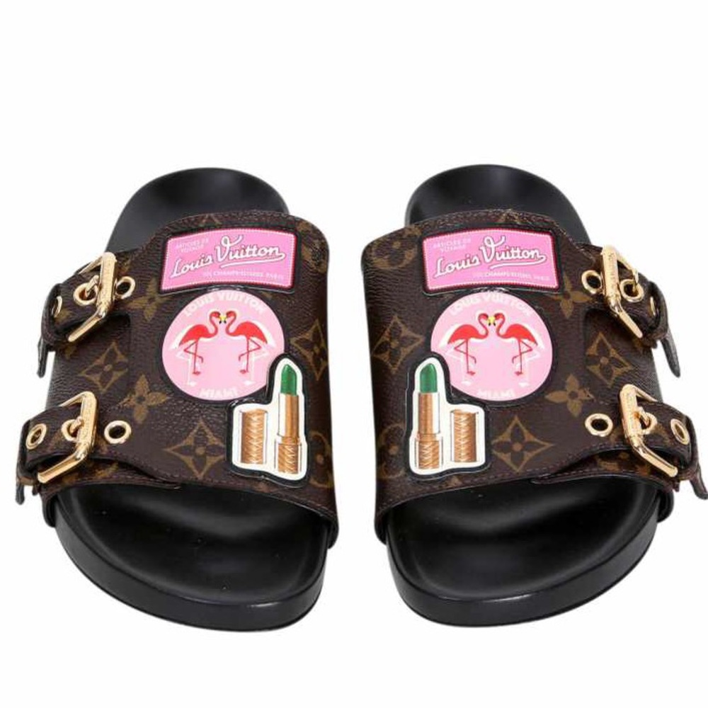 Louis Vuitton leather slides with graphics